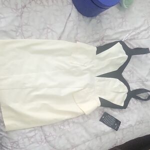 bebe Black and Cream Fit-and-Flare Peplum Dress